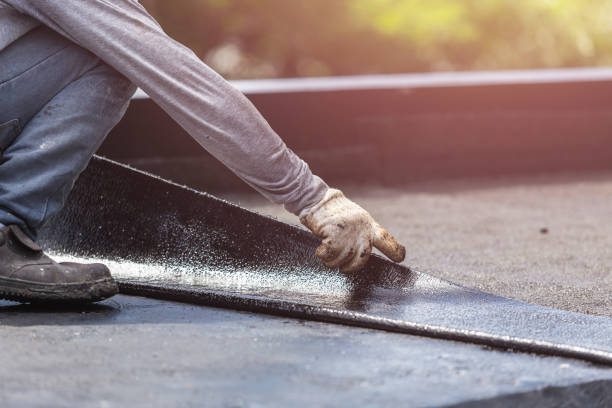 Professional Basement Waterproofing technician working in Clarklake, MI